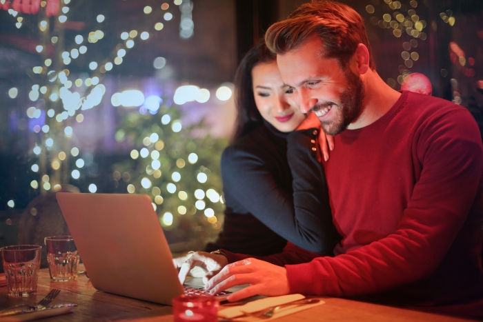 Couple ordering Christmas presents online