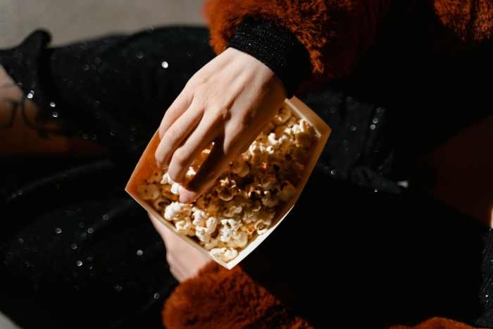 Eating popcorn at the cinema