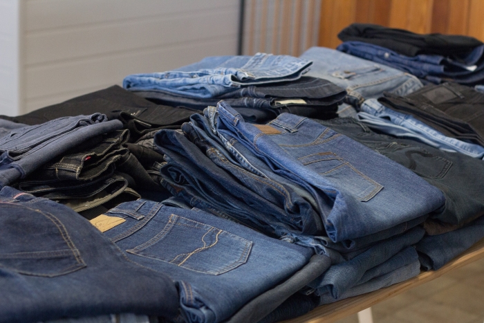 Piles of denim jeans