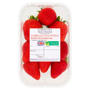 A clear plastic box containing several red strawberries, labeled "Essential Waitrose A Little Less Than Perfect British Strawberries." The net weight is 250g.