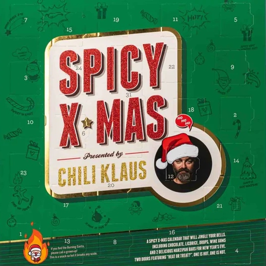 A Santa figure against a green background on the front cover of Chilli Klaus chilli advent calendar