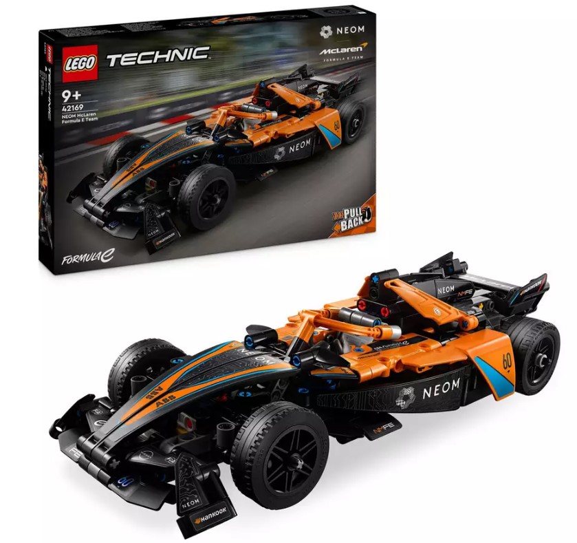 LEGO Technic Formula 1 car set featuring an orange and black race car with pull-back function, displayed next to its box. Suitable for ages 9 and up.