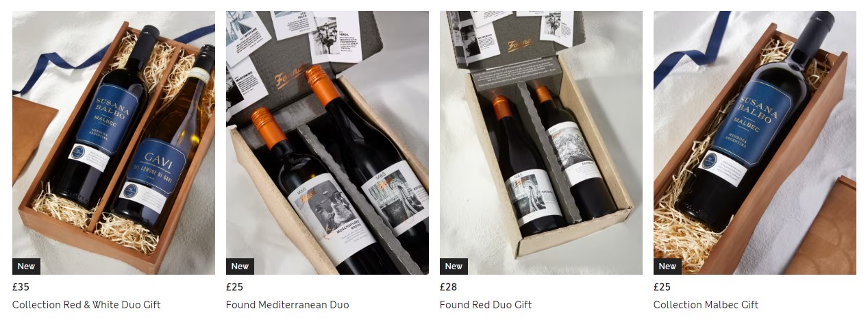 Four gift boxes showcasing different wine collections, each with two bottles of wine. Prices are displayed below each box.