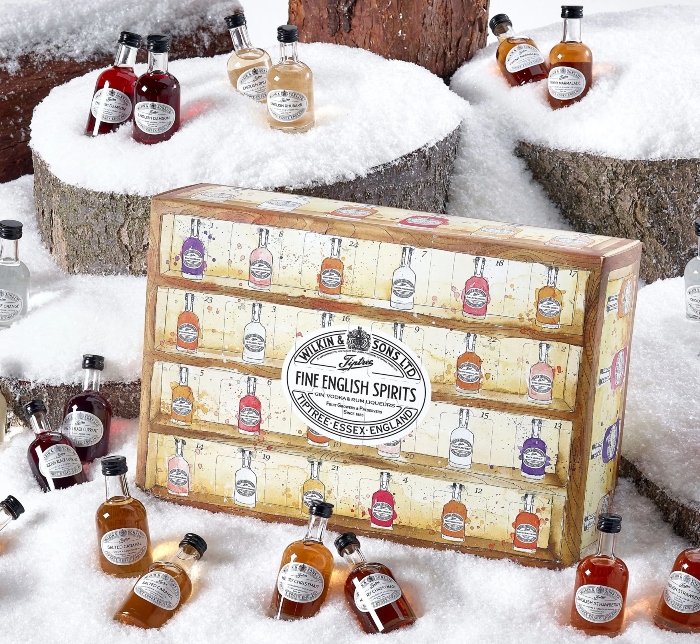 A picture of a spirits advent calendar, showing a box surrounded by small liqueur bottles