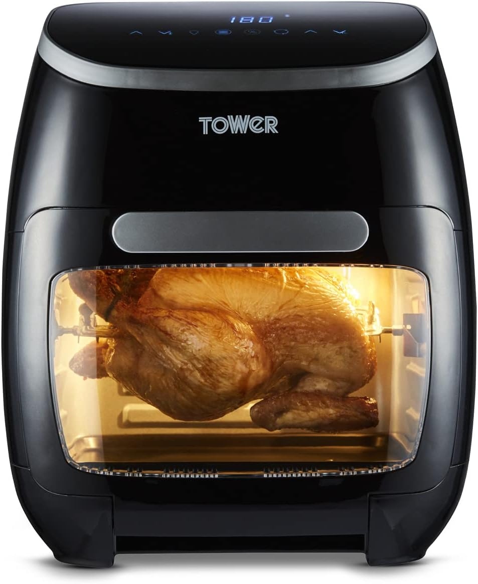 An image showing a Tower air fryer cooking a piece of meat