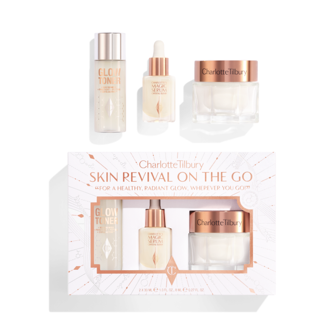 Charlotte Tilbury skin care set with toner, serum, and cream in rose gold packaging, labeled "Skin Revival On The Go.