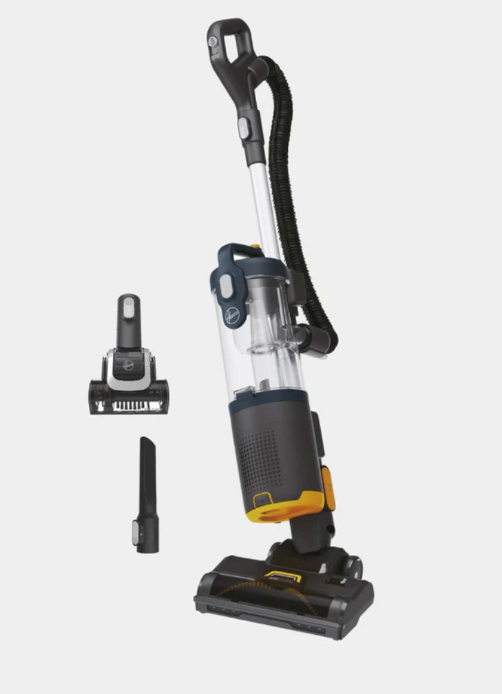 Upright vacuum cleaner with detachable hose, clear dustbin, crevice tool, and brush attachment on a white background.