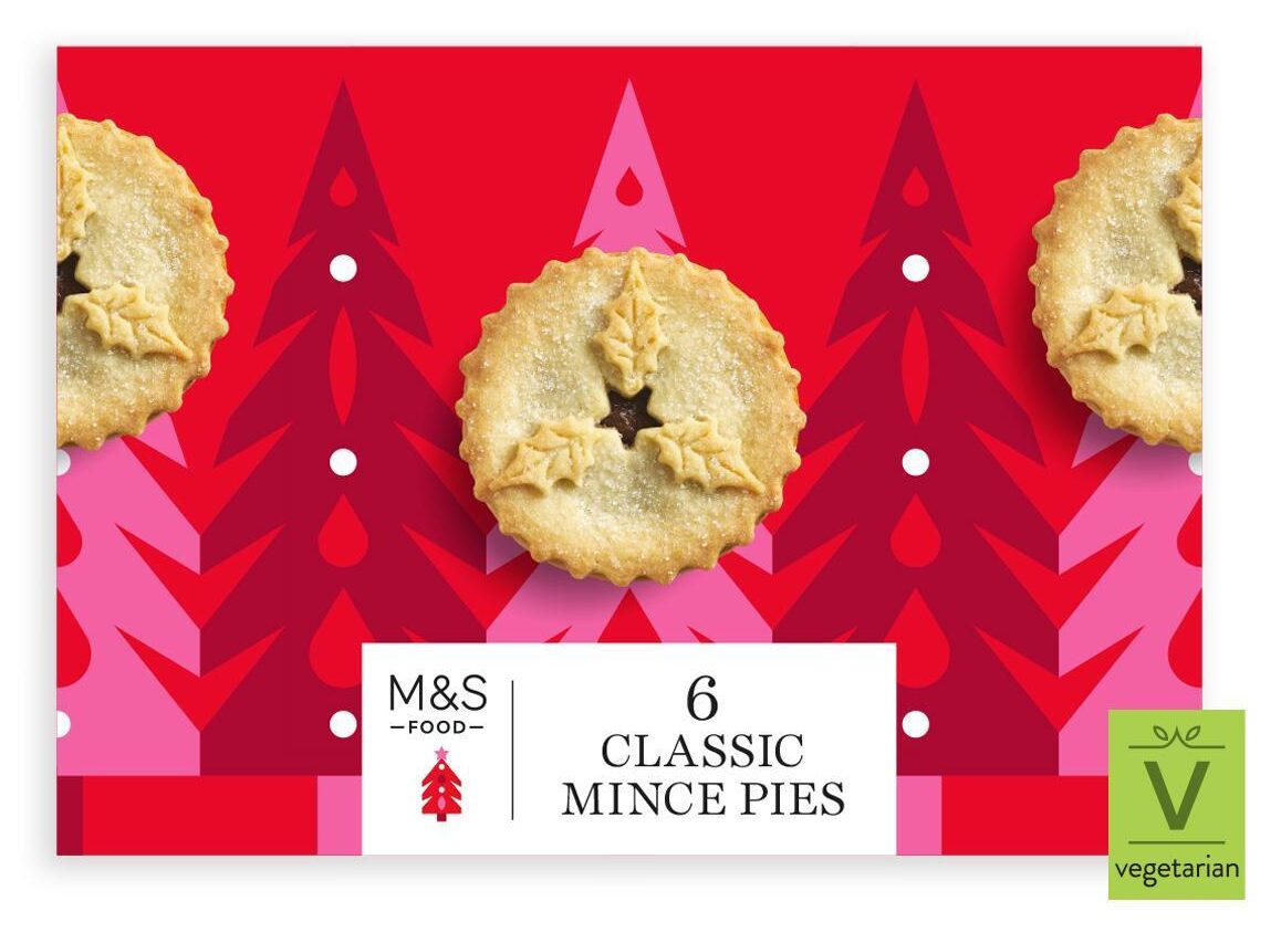 Box of six classic mince pies on a red and pink festive background with tree designs. Marked as vegetarian.