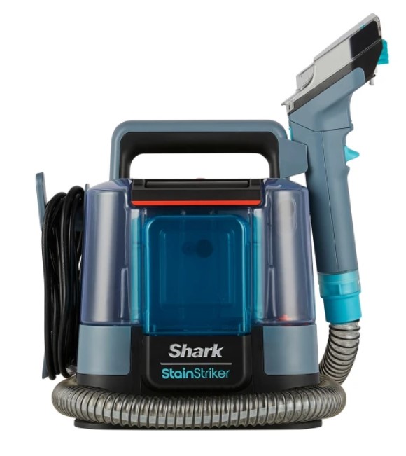 A portable Shark StainStriker carpet cleaner with a hose attachment, set against a plain background.