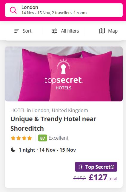 Hotel booking page for a unique and trendy hotel in Shoreditch, London, featuring bright pink pillows and a price reduction offer.