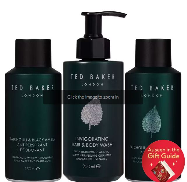 Three Ted Baker grooming products: antiperspirant deodorant, hair and body wash, and moisturizer, with dark green packaging. A red sticker indicates a feature in a gift guide.