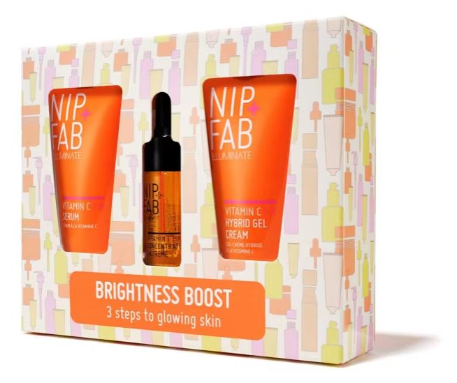 Nip + Fab Brightness Boost skincare set with Vitamin C Serum, Hybrid Gel Cream, and packaging with colorful patterns.