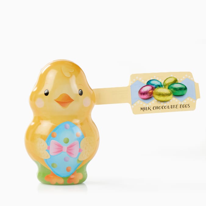 A yellow chick-shaped container with a blue egg design, labeled "Milk Chocolate Eggs," shown against a white background.