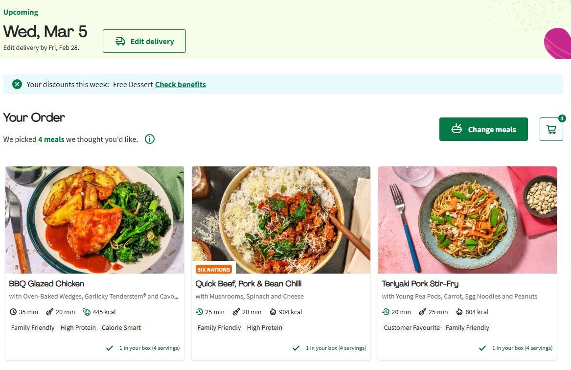 Online food delivery order interface showing a selection of meals: BBQ Glazed Chicken, Quick Beef, Pork & Bean Chilli, and Teriyaki Pork Stir-Fry with details and calorie information.